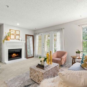living room with a fireplace and great view