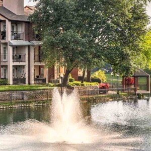 view of fountain in lake and gazebo